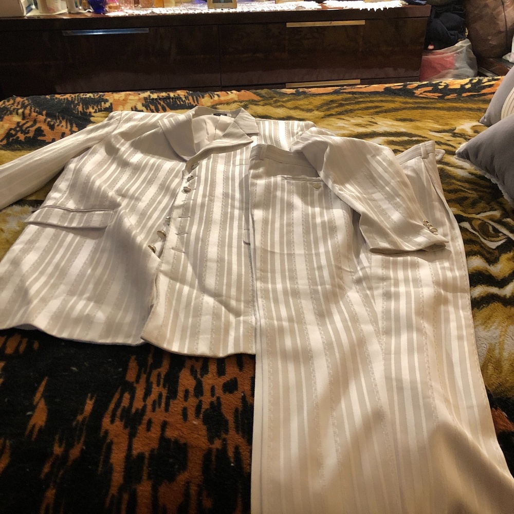 This is a Mans white Suit